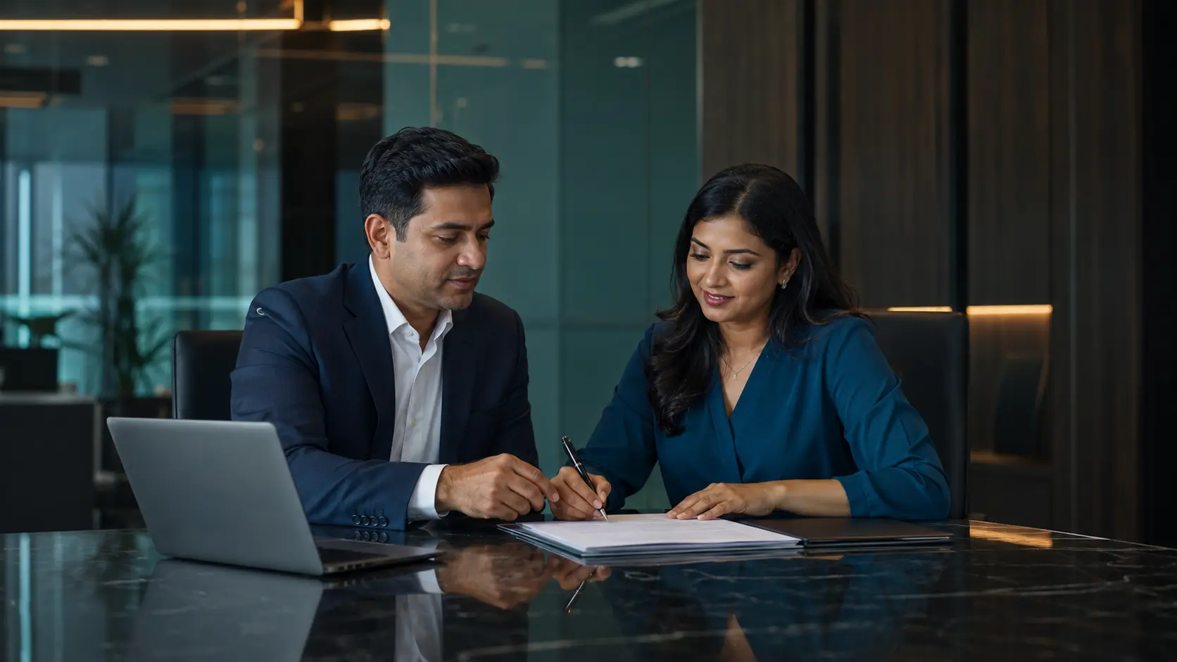 Indian consultant and business client reviewing a professional engagement